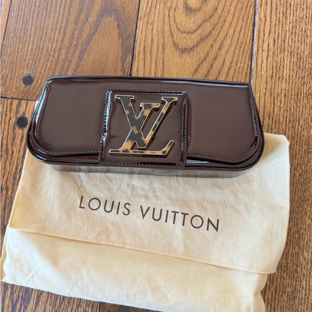 AUTH NWOT LOUIS VUITTON Sobe Leather Clutch Amarante